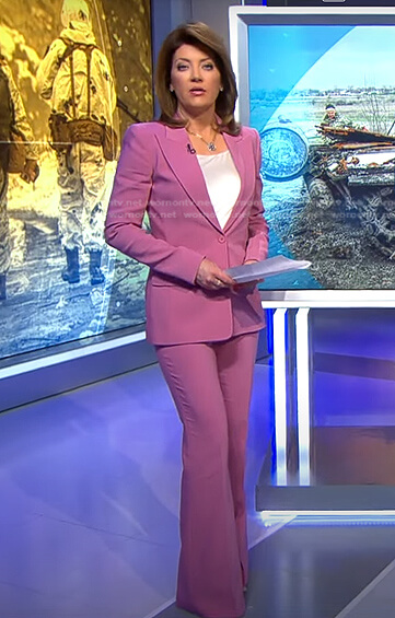Norah’s pink blazer and flare pants on CBS Evening News