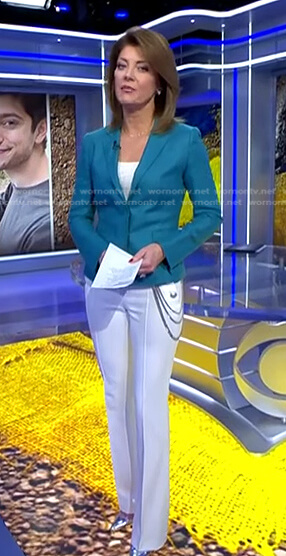 Norah's white chain detail pants on CBS Evening News