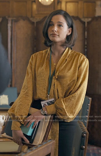 Olivia's gold tie neck blouse on Anatomy of a Scandal