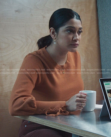 Padma's orange lace-up cuff sweater on The Resident
