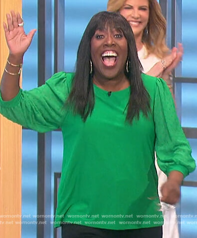 Sheryl's green sheer sleeve top on The Talk