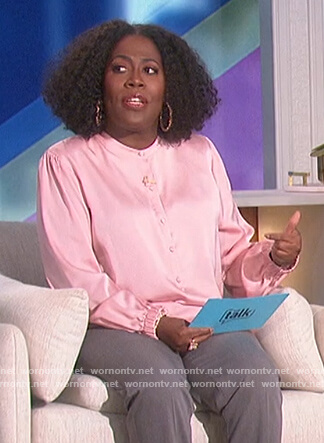 Sheryl's pink collarless blouse on The Talk