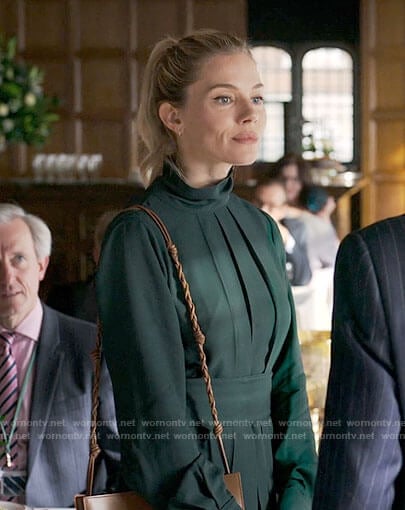 Sophie's dark green pleated dress on Anatomy of a Scandal