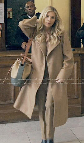 Sophie’s tan coat and two-tone bucket bag on Anatomy of a Scandal
