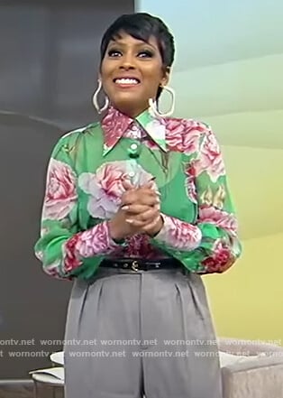 Tamron's green floral print blouse on Tamron Hall Show