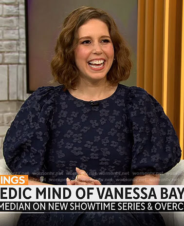 Vanessa Bayer's navy floral puff sleeve top and pants set on CBS Mornings