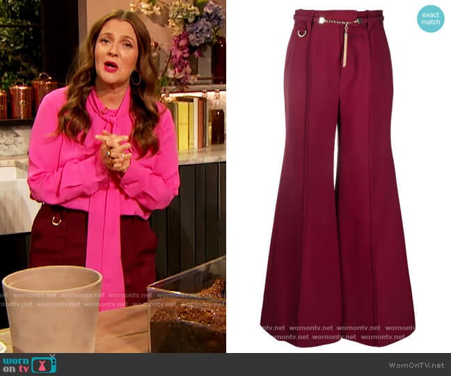 Chain-link detail flared trousers by Zimmermann worn by Drew Barrymore on The Drew Barrymore Show