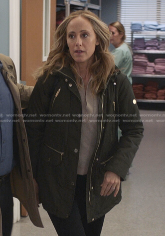 Teddy's beige collared sweater and green field jacket on Greys Anatomy