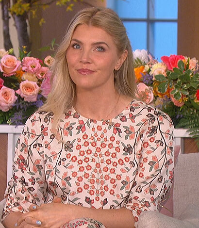 Amanda’s white floral print top and skirt on The Talk
