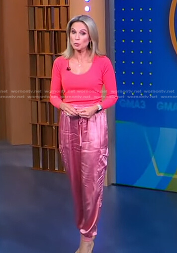 Amy's orange scoop neck top and pink satin pants on Good Morning America