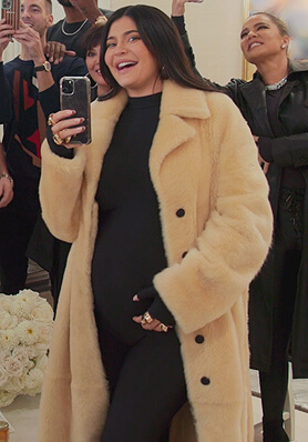 Kylie's beige shearling coat on The Kardashians