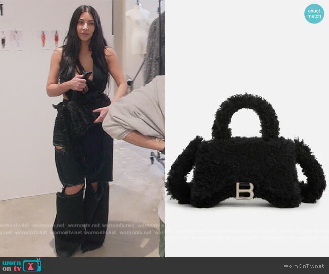 Small Hourglass Shearling Handbag by Balenciaga worn by Kim Kardashian (Kim Kardashian) on The Kardashians