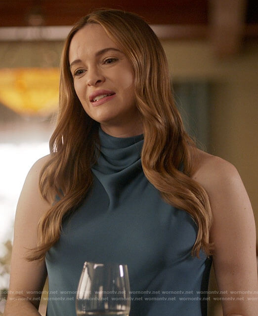 Caitlin’s blue dress at Frost’s funeral on The Flash