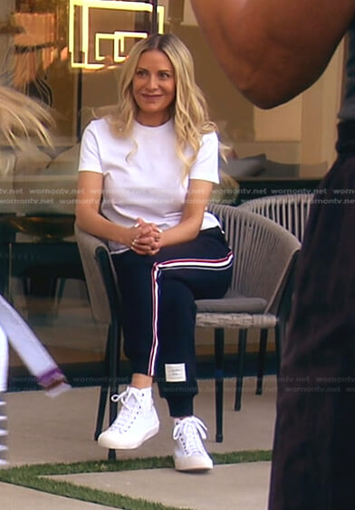 Dorit's white tee and navy track pants on The Real Housewives of Beverly Hills