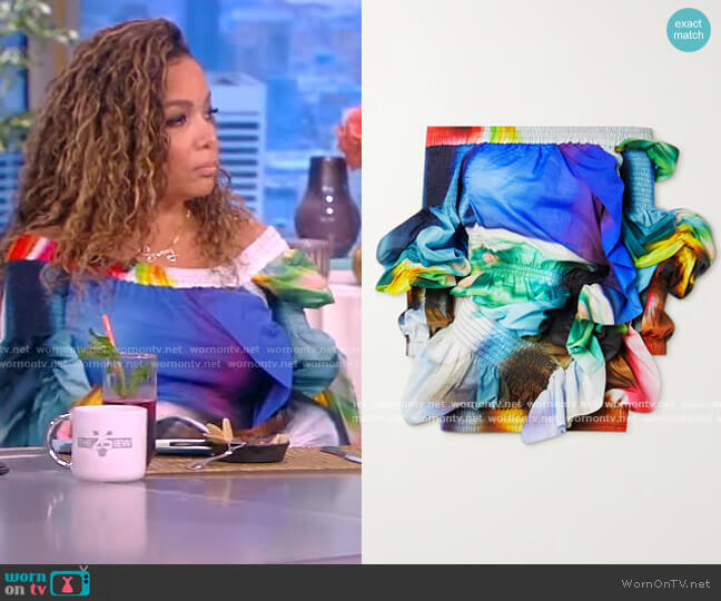 Off-the-shoulder smocked printed cotton blouse by Dries Van Noten worn by Sunny Hostin on The View