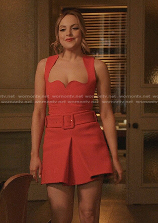 Fallon’s red scalloped cropped top and belted skirt on Dynasty