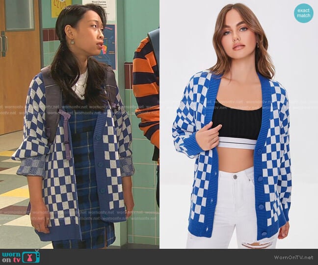 WornOnTV: Emily's turquoise blue cardigan and printed pleated mini