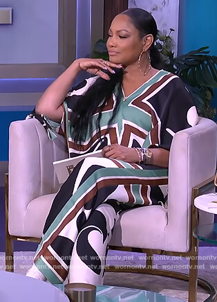 Garcelle's abstract print blouse and pants on The Real