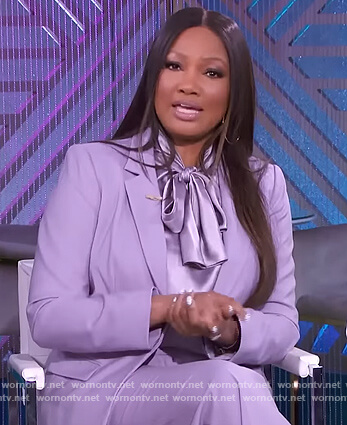 Garcelle's lilac blazer and blouse on The Real