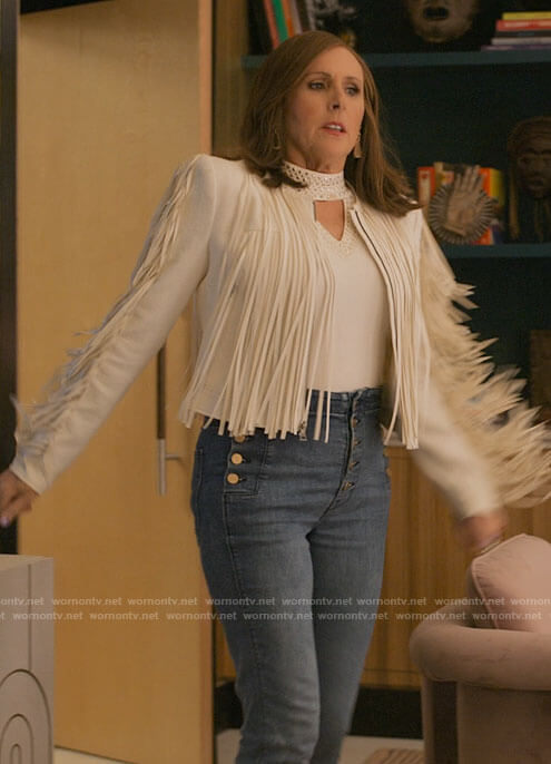 Jackie’s white fringed jacket and button detail jeans on I Love That For You
