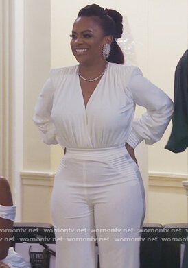 Kandi's white plunging jumpsuit on The Real Housewives of Atlanta