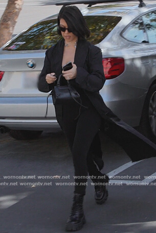 Kourtney’s black leather mini bag on The Kardashians