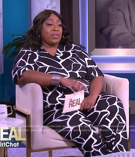 Loni's black contrast floral print jumpsuit on The Real
