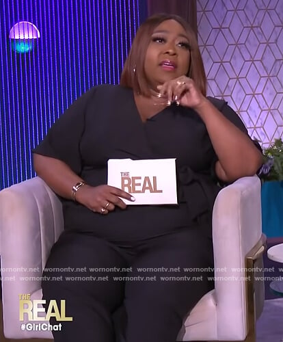 Loni's black wrap jumpsuit on The Real