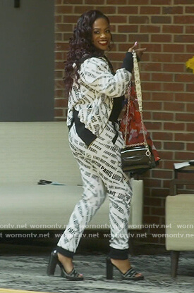 Kandi's white Loui Vuitton logo track jacket on The Real Housewives of Atlanta