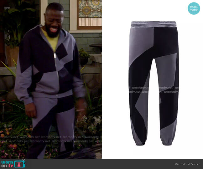 McQ Dazzle Sweatpants worn by Malcom (Sheaun McKinney) on The Neighborhood