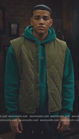Nathan’s green WNKA hoodie on Naomi
