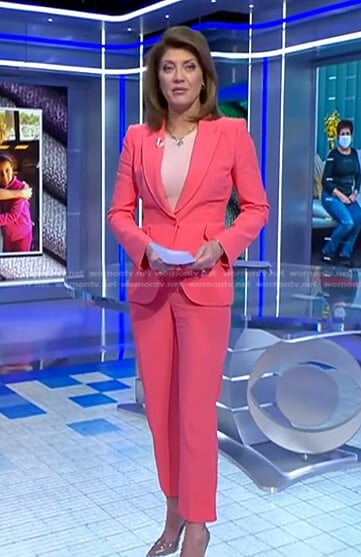 Norah’s pink blazer and trousers on CBS Evening News