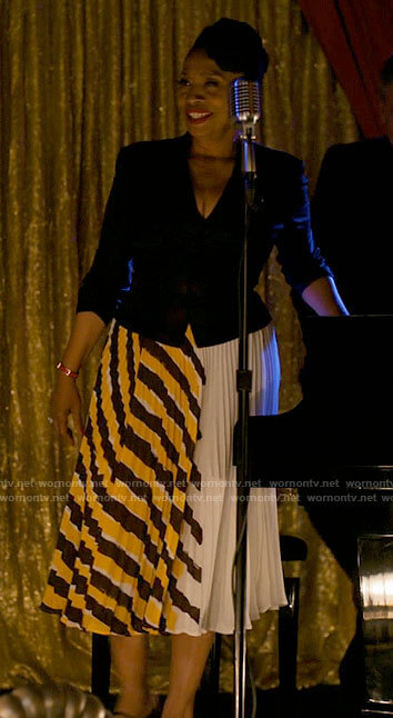 Patricia’s pleated skirt with yellow stripes on I Love That For You