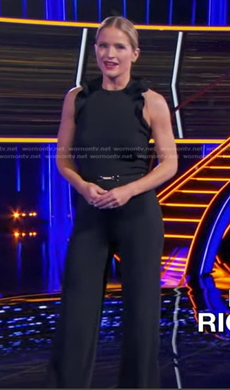 Sara's black ruffle jumpsuit on The Chase