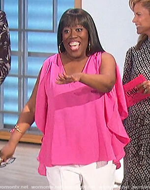 Sheryl's pink ruffle sleeve top on The Talk