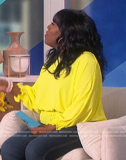 Sheryl’s yellow smocked waist top on The Talk