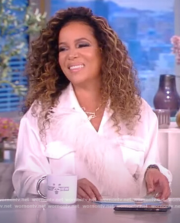 Sunny’s white feather trim satin shirtdress on The View
