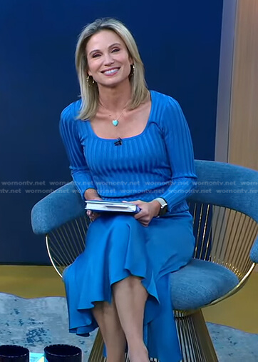 Amy’s blue ribbed scoop neck sweater and satin skirt on Good Morning America