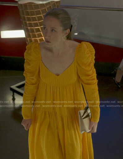 Becky's orange puff sleeve dress on Chloe