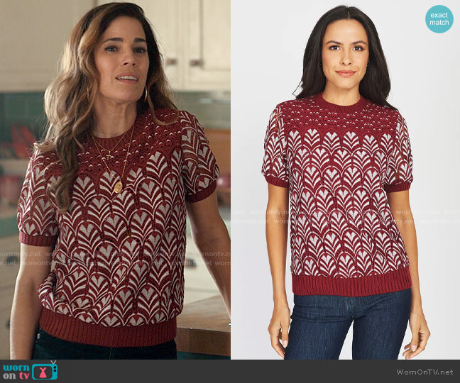 Isabel’s red patterned short sleeve sweater on Love Victor
