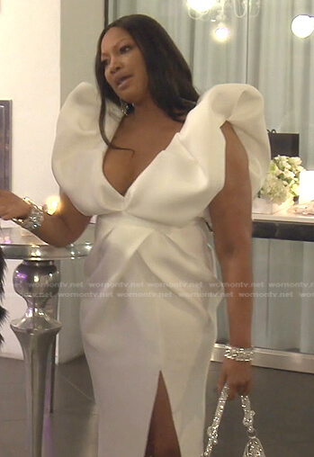 Garcelle's white puff v-neck dress and earrings on The Real Housewives of Beverly Hills