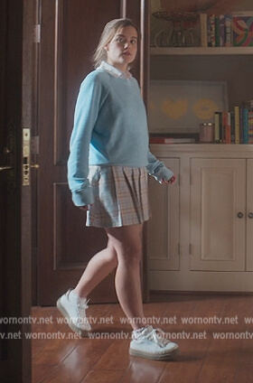 Juliette’s white sneakers and skirt on First Kill