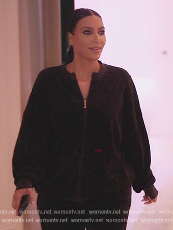 Kim's black velour sweatshirt on The Kardashians
