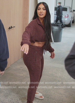 Kim’s burgundy knit top and pants on The Kardashians