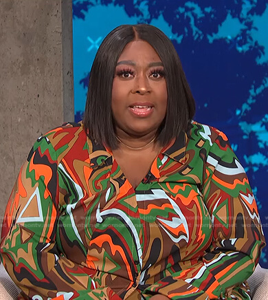 Loni’s abstract print blouse and pants on E! News Daily Pop