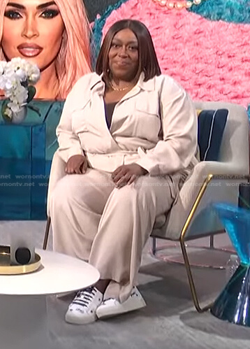 Loni's ivory utility jumpsuit on E! News Daily Pop