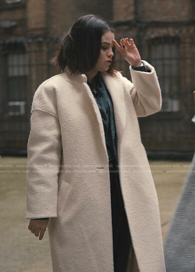 Mabel’s white oversized coat on Only Murders in the Building