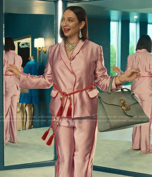 Molly’s pink satin suit with tassel belt on Loot