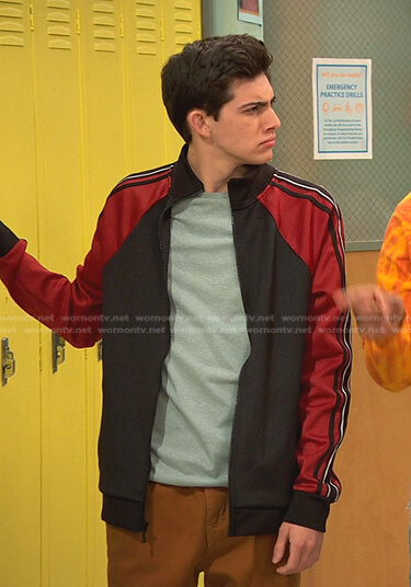 Neil’s red and black colorblock track jacket on Ravens Home