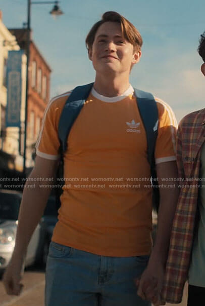 Nick’s orange Adidas t-shirt on Heartstopper